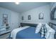 Bedroom showcasing a full-sized bed, stylish decor, and neutral tones to create a cozy and inviting space at 1081 Magnolia Warbler Way, Ravenel, SC 29470