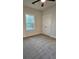 Carpeted bedroom with closet and trim at 110 Cypress St, Summerville, SC 29483