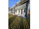 Charming front porch with white columns and a covered entrance at 110 Cypress St, Summerville, SC 29483