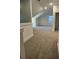 Upstairs hallway with neutral carpet leading into rooms with a view at 110 Cypress St, Summerville, SC 29483