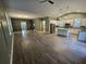 Open layout with center island, stainless appliances and pendant lights in the kitchen at 110 Cypress St, Summerville, SC 29483