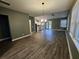 Open-concept living space featuring wood-look floors and neutral wall colors at 110 Cypress St, Summerville, SC 29483