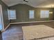 Spacious living area with hard surface floors and a kitchen island with granite countertops at 110 Cypress St, Summerville, SC 29483