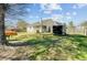 Spacious backyard with a patio area and fenced-in yard, perfect for outdoor activities at 112 Retriever Ln, Goose Creek, SC 29445