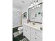 Well-lit bathroom with a shower/tub combo, tiled floor and a vanity with a large mirror at 112 Retriever Ln, Goose Creek, SC 29445