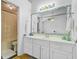 Classic bathroom with a white vanity, decorative mirror, and a shower/tub combo at 112 Retriever Ln, Goose Creek, SC 29445