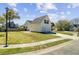 Well-maintained home with a two-car garage, lush lawn, and a neatly paved driveway at 112 Retriever Ln, Goose Creek, SC 29445