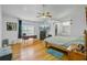 Bright and open main bedroom with hardwood floors, vaulted ceilings, and an en-suite bathroom at 112 Retriever Ln, Goose Creek, SC 29445
