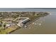 Aerial view of waterfront condo with nearby beachfront homes and dockage for easy boating access at 116 Bay Creek Villa, Edisto Beach, SC 29438