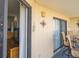 Relaxing balcony with comfortable seating, offering stunning views of the surrounding area at 116 Bay Creek Villa, Edisto Beach, SC 29438
