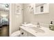 Bright bathroom with a modern vanity, brushed nickel fixtures, and neutral paint at 116 Bay Creek Villa, Edisto Beach, SC 29438