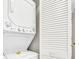 Convenient laundry area with stacked washer and dryer, as well as some storage at 116 Bay Creek Villa, Edisto Beach, SC 29438