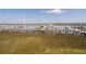 Beautiful view of the marina docks with multiple boats at 116 Bay Creek Villa, Edisto Beach, SC 29438