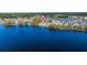 Community aerial view featuring homes, a lake, and neighborhood amenities at 122 Yorkshire Dr, Moncks Corner, SC 29461