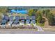 A high angle shows houses in a neighborhood next to a pond at 122 Yorkshire Dr, Moncks Corner, SC 29461