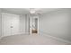Bedroom with a double closet, neutral carpet and walls at 122 Yorkshire Dr, Moncks Corner, SC 29461
