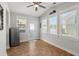 Bright sunroom with multiple windows offering ample natural light and views of the backyard at 122 Yorkshire Dr, Moncks Corner, SC 29461