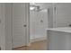 Modern bathroom with walk-in shower, tiled flooring, and neutral color palette at 128 Cantona Dr, Summerville, SC 29483
