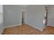 Empty bedroom with vinyl floors, a window, and ensuite bathroom access at 128 Cantona Dr, Summerville, SC 29483