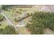 Aerial view of house with surrounding wooded land at 1298 French Santee Rd, Jamestown, SC 29453