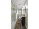 Stylish bathroom features a glass-enclosed shower and a vanity with modern fixtures at 1298 French Santee Rd, Jamestown, SC 29453
