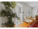 Bright entryway showcasing hardwood floors, classic details, and a view into the living area at 1298 French Santee Rd, Jamestown, SC 29453