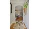 Inviting entryway with hardwood floors, arched doorway, and a view into the stylish living room at 1298 French Santee Rd, Jamestown, SC 29453