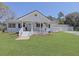Charming ranch-style house featuring a front porch and a well-manicured lawn at 1298 French Santee Rd, Jamestown, SC 29453