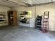 Garage features a concrete floor with ample space for storage and shelving at 1298 French Santee Rd, Jamestown, SC 29453