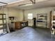 Garage view with shelving, workbench, and tools at 1298 French Santee Rd, Jamestown, SC 29453
