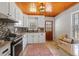 Well-appointed kitchen with stylish countertops, stainless steel appliances, and a charming breakfast nook at 1298 French Santee Rd, Jamestown, SC 29453