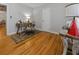 Bright home office features wood floors, a desk, and natural light at 1298 French Santee Rd, Jamestown, SC 29453