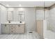Bathroom featuring double sinks, shaker cabinets, and a walk-in shower, providing a luxurious and convenient space at 1360 Burr Hill Rd, Cottageville, SC 29435