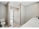 A bathroom features a walk-in shower, a toilet and a countertop with sink at 1360 Burr Hill Rd, Cottageville, SC 29435