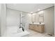 Bathroom showcasing a soaking tub, double sinks, and wood-look flooring for a relaxing and spa-like experience at 1360 Burr Hill Rd, Cottageville, SC 29435