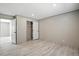 A spacious bedroom with wood-look floors includes a closet and white trim at 1360 Burr Hill Rd, Cottageville, SC 29435