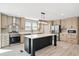 A well-equipped kitchen with a large island, stainless steel appliances, and ample counter space at 1360 Burr Hill Rd, Cottageville, SC 29435