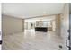 View of an open floor plan with a living area that flows into a modern kitchen with an island at 1360 Burr Hill Rd, Cottageville, SC 29435