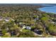An areal community view with river access, beautiful homes, and many mature trees at 1367 N Edgewater Dr, Charleston, SC 29407