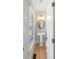 Powder room featuring white pedestal sink and hardwood floors at 1367 N Edgewater Dr, Charleston, SC 29407