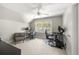 Neutral bedroom provides a large window and a ceiling fan at 1367 N Edgewater Dr, Charleston, SC 29407