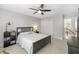 Bedroom featuring a ceiling fan, large window, and carpeted floors at 1367 N Edgewater Dr, Charleston, SC 29407