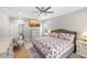Comfortable bedroom featuring a ceiling fan, TV, and a peaceful decor at 1367 N Edgewater Dr, Charleston, SC 29407