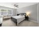 Light filled bedroom with a large window, neutral paint, and carpeted floors at 1367 N Edgewater Dr, Charleston, SC 29407