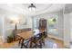 Beautiful dining room is brightly lit with hardwood floors and a view to the outside through large windows at 1367 N Edgewater Dr, Charleston, SC 29407