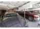 Attached garage featuring 2 cars and overhead storage at 1367 N Edgewater Dr, Charleston, SC 29407