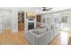 Inviting living room with a fireplace, built-in bookshelves, and an abundance of natural light at 1367 N Edgewater Dr, Charleston, SC 29407