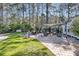 Beautiful backyard with a seating area under a pergola, a brick patio, and a manicured lawn at 1391 Crane Creek Dr, Mount Pleasant, SC 29466