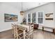 Dining room with chandelier and large windows offering abundant natural light at 1391 Crane Creek Dr, Mount Pleasant, SC 29466