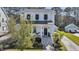 Beautiful two-story home with a welcoming front porch, well-kept landscaping, and a private driveway at 1391 Crane Creek Dr, Mount Pleasant, SC 29466